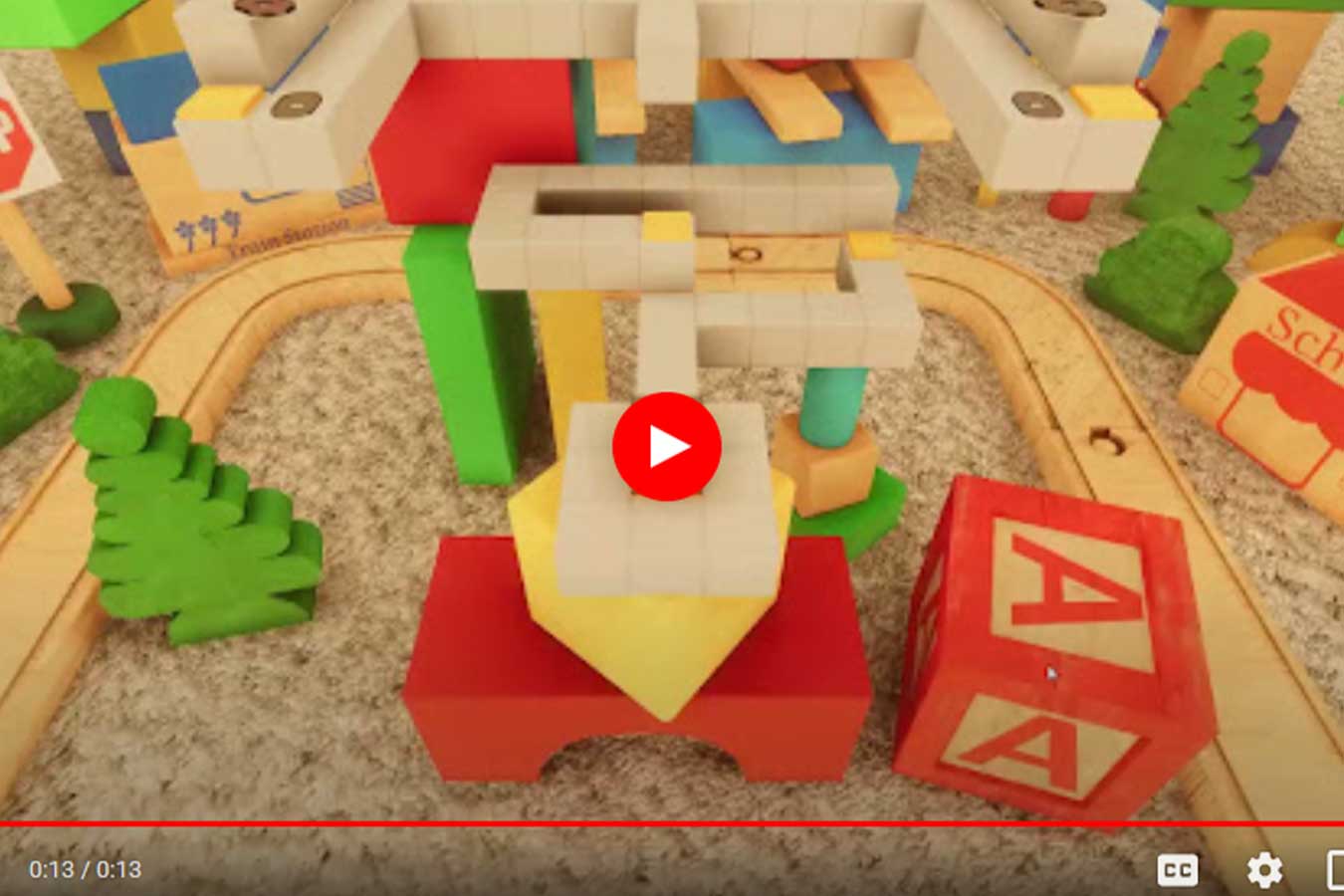 Image of Jacob Hoge's game level that won best of fall term featuring toy blocks, Lego-like toys, and a toy train running on a track.