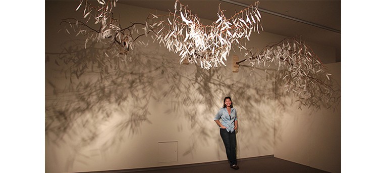 Angela Behrends with her artwork titled, Ascension II