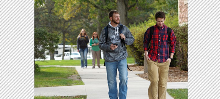 Students walking across DSU campus