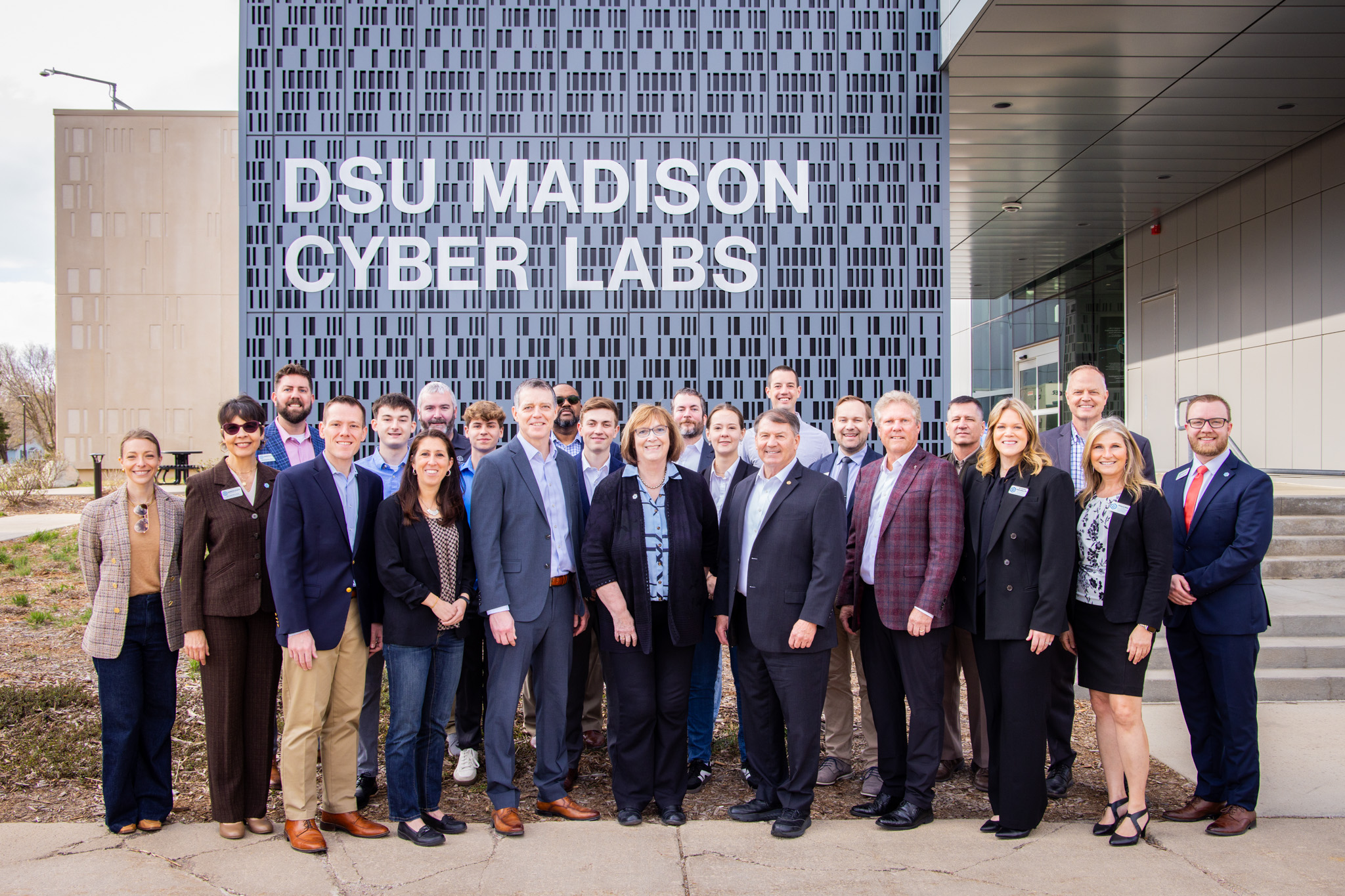 Group photo of dignitaries at Madison Cyber Labs