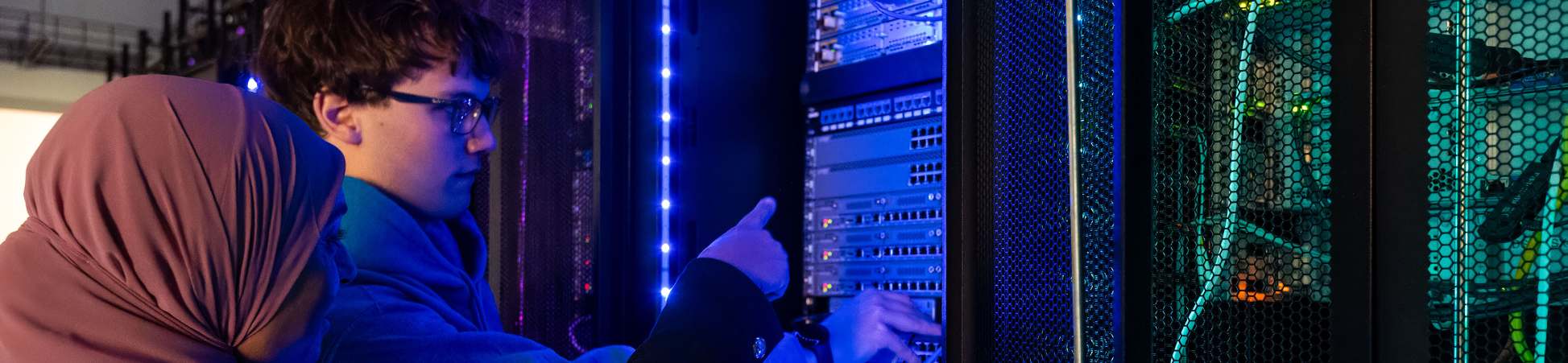 dsu professor and student in server room