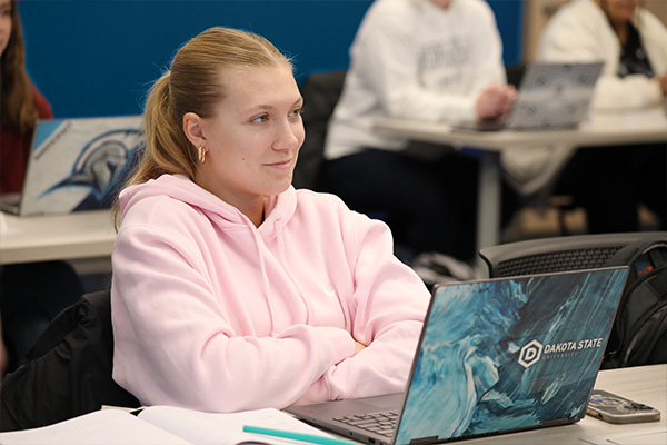 Business marketing student attending a lecture