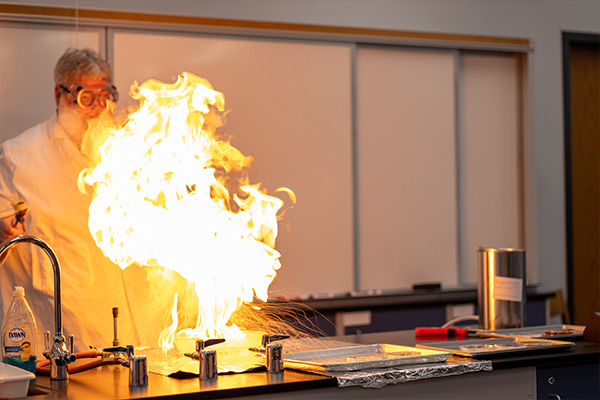 Chemistry professor creating a fireball in class.