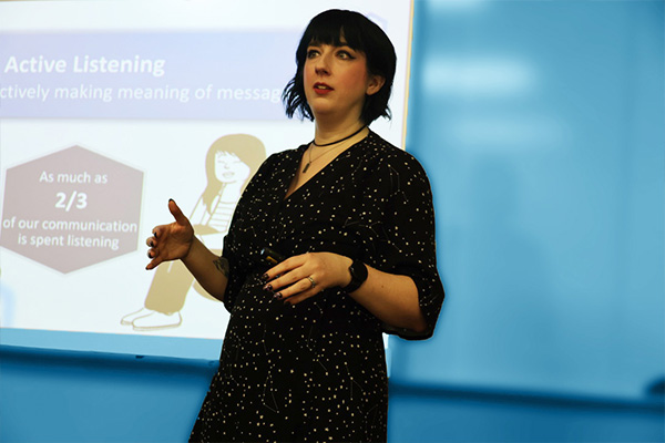 A communication studies professor delivers a lecture on active listening.