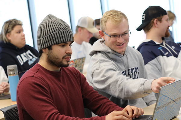 Computer education students attending class.