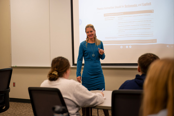 English as a new language professor teaching students about phonics.