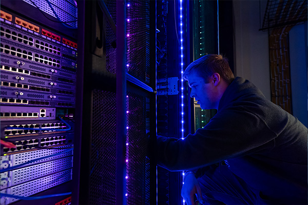 Ethics in Technology student working in a server room