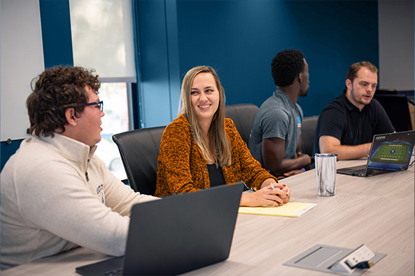 information technology management students in class