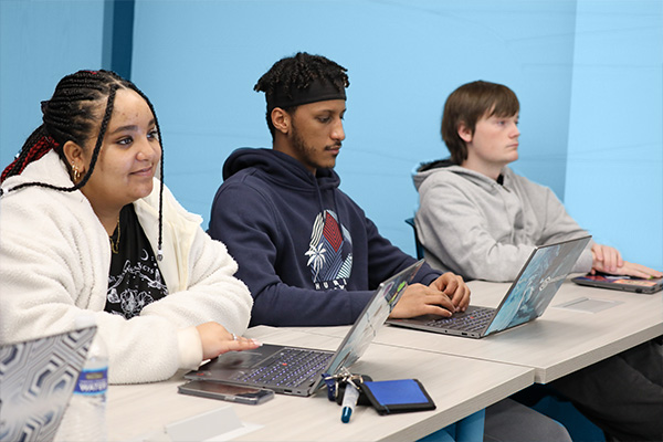 Marketing students sitting at a table