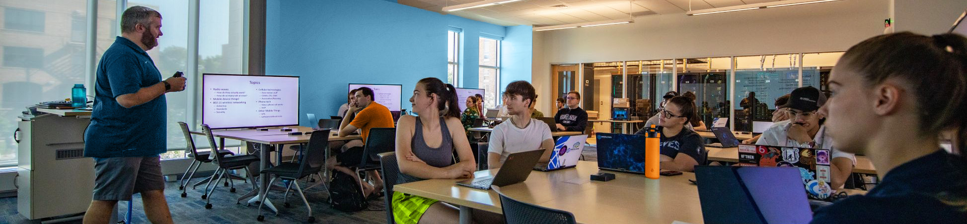 Students in class listening to professor
