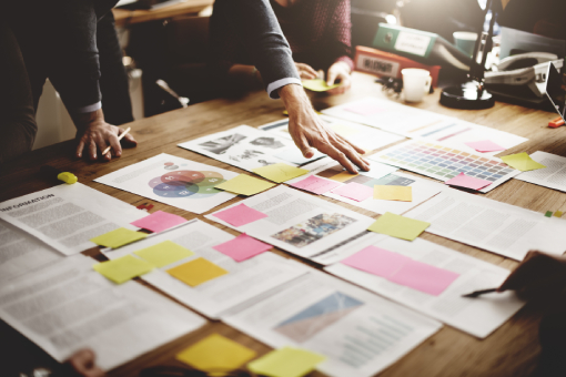 papers spread out on desk