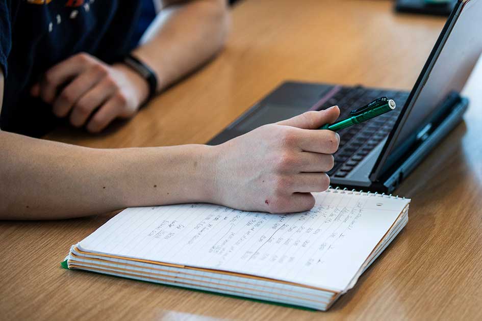 close up of student at a desk