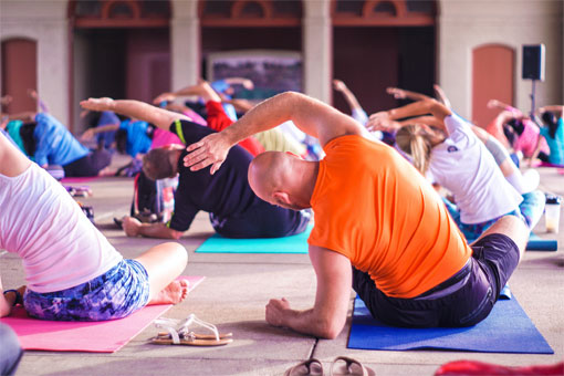 Students participating in a yoga class.