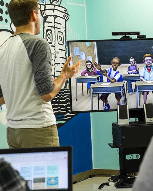 student using virtual classroom to teach