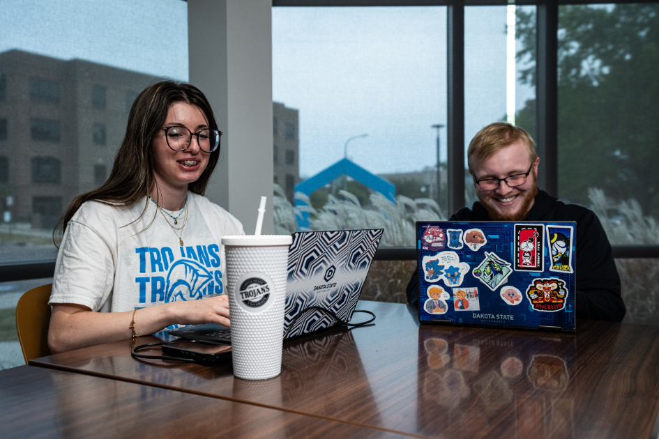 Two students working on computers