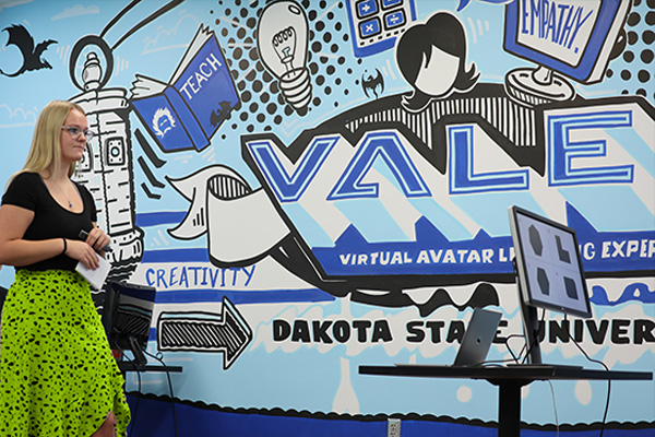 Master of science in education technology student working in the virtual classroom lab.