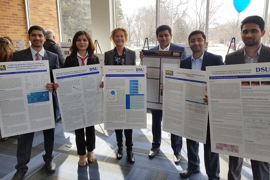 DSU students presenting research boards
