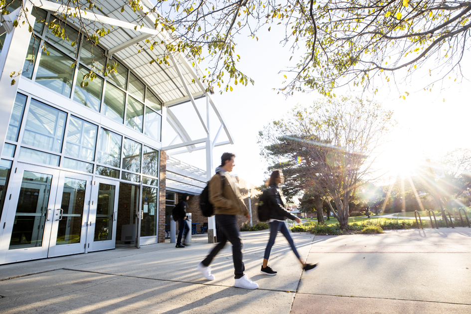 DSU students walking around campus during class