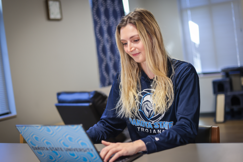 student working on laptop