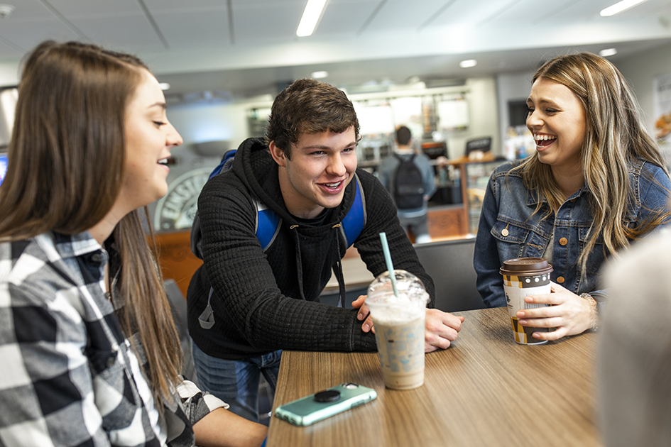 students talking over coffee