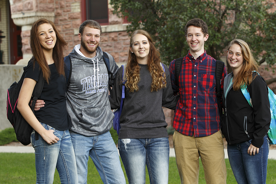 group of students standing together on campus